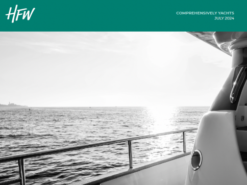 A black and white photo of a yacht's deck overlooking a calm sea at sunset. The HFW logo and the words Comprehensively Yachts July 2024 appear on a teal banner at the top.