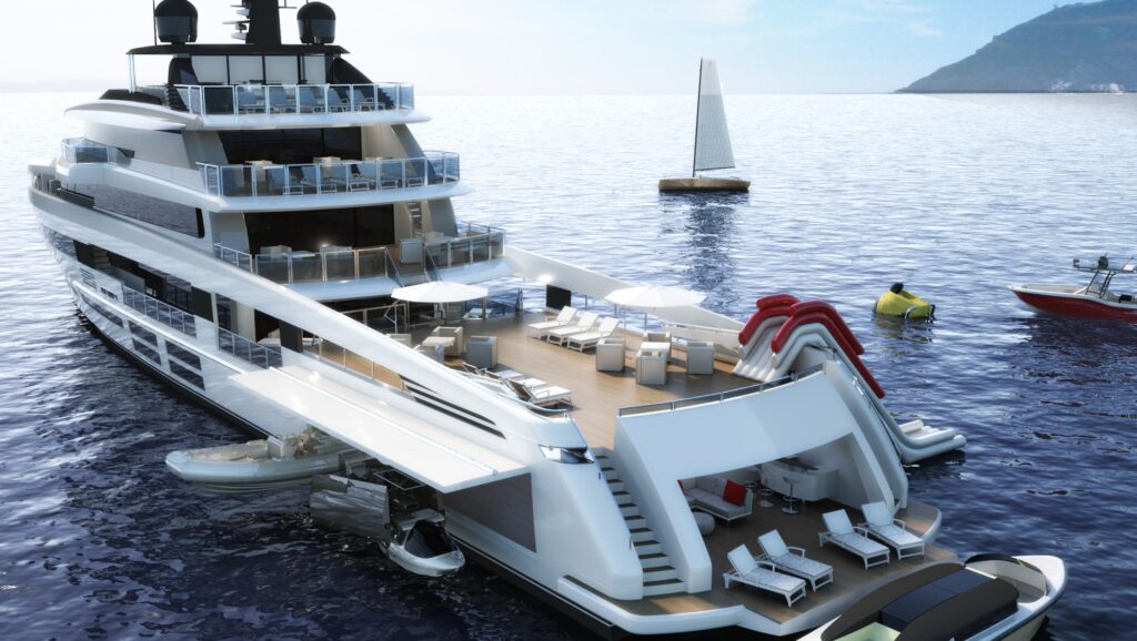 A luxury yacht with multiple decks and outdoor seating is moored in calm blue water. There is a spiral slide leading into the sea, nearby sailing boats, and a distant mountain under a clear sky.