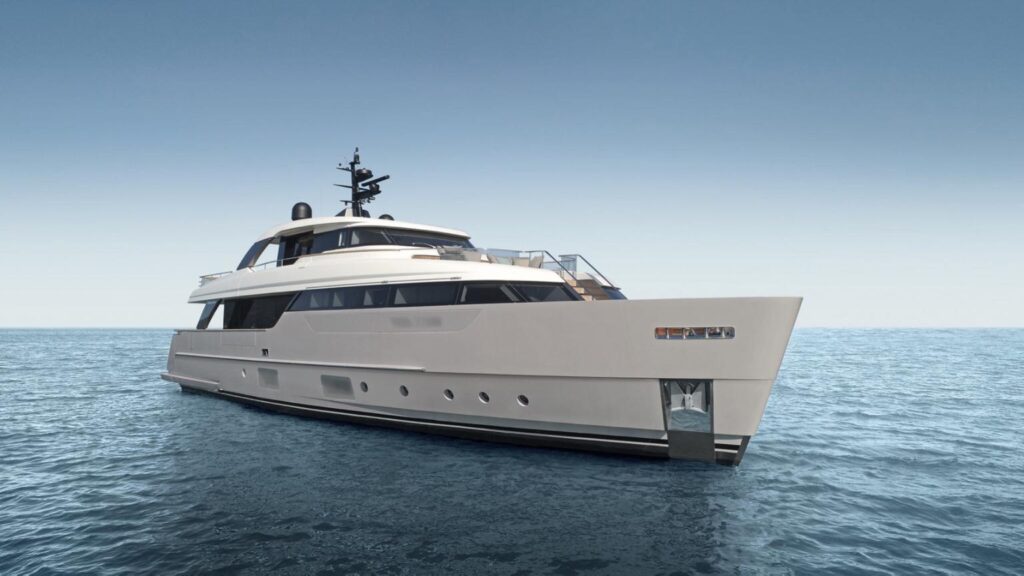 A modern luxury yacht with sleek, angular lines floats on calm blue water under a clear sky, viewed from the front left side.