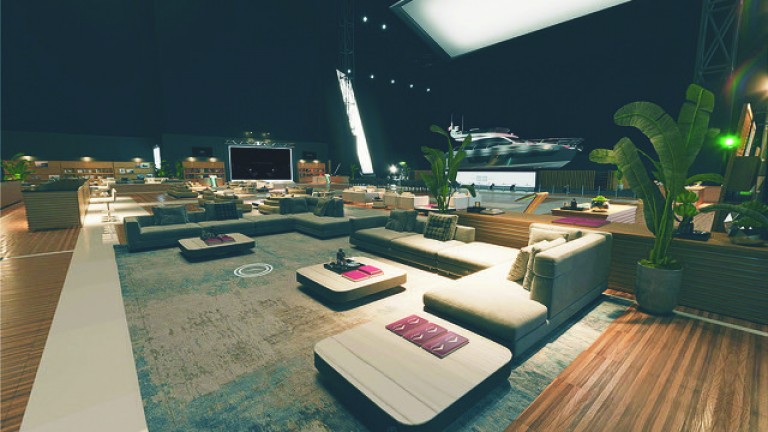 A spacious, modern lounge features large corner sofas, low tables with purple cushions, potted plants, wooden flooring, and soft lighting. In the background, there are shelves, a television, and a yacht display.