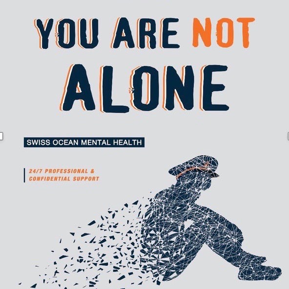 A graphic shows a seated person made of fragmented lines, suggesting distress. Above, bold text reads You Are Not Alone. Below, it says Swiss Ocean Mental Health with a note on 24/7 professional & confidential support.