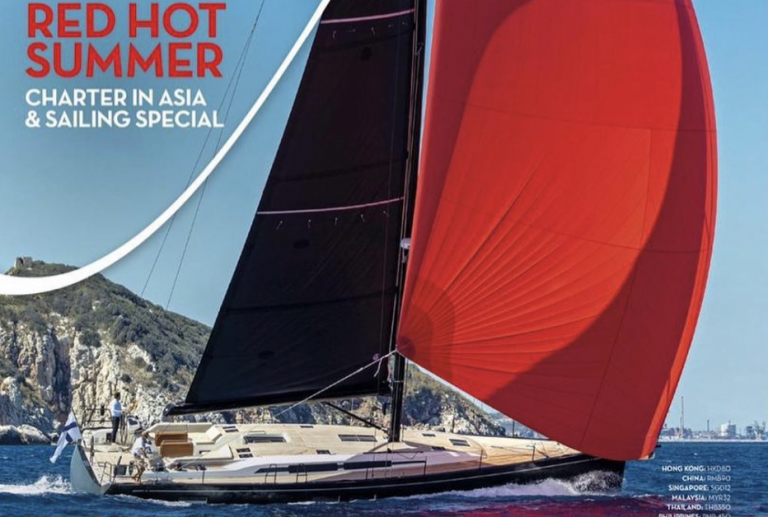 A sleek yacht with a large red sail glides on the ocean near rocky cliffs. The text reads, Red Hot Summer: Charter in Asia & Sailing Special. Small destination names are listed at the bottom right.