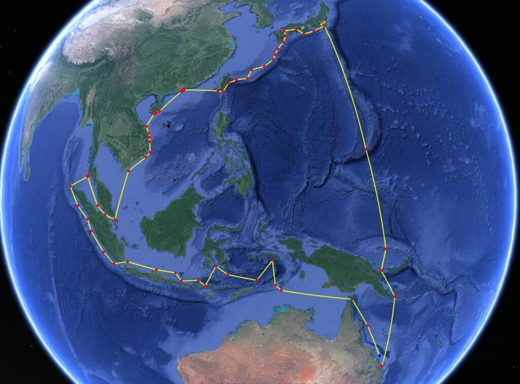 A satellite image of Earth showing East and Southeast Asia, Australia, and the Pacific Ocean, with a yellow line connecting red and blue points, marking a travel or route path across various countries and islands.