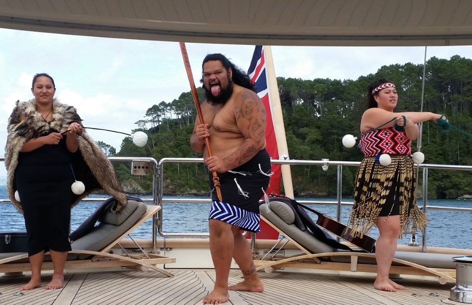Māori performing arts specialists delivering a traditional welcome onboard a superyacht